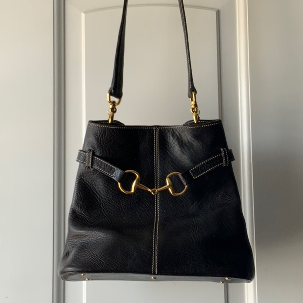 Black Leather Horse Bit Handbag with small attached bag inside and two handles.